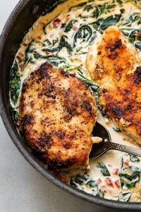 This Creamy Chicken Florentine is made with baby spinach in a light and creamy white sauce. It's undeniably delicious! #chicken #chickenbreast #dinner #weightwatchers #spinach