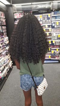 Long, thick, beautiful curly hair.