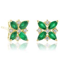 A stunning mix of gemstones set in 18-karat yellow gold, these petite earrings feature a star of emeralds surrounded by sparkling diamonds. Since 1861, Gump's has been a destination for jewelry that is distinctive and timeless. To ensure each piece is created to our exacting standards, our expert in-house jewelry team oversees every step of the production process. The result is a statement of pure elegance. Emeralds, 0.56ctw. Diamonds, 0.12ctw. 18-karat yellow gold. Pierced only. 1/4"H x 1/4"W.