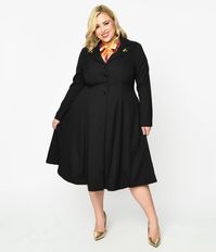 Channel your inner chocolatier with this charming plus size black long coat, in collaboration with Willy Wonka! The collared neckline features Wonka inspired lapel pins for extra sweetness. The long sleeves feature shoulder pads for an added shape.