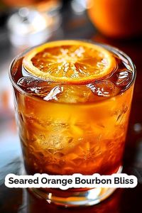 Indulge in the delightful aromas and rich flavors of Bourbon Brûlé, a sophisticated mix of bourbon, ginger liqueur, sherry, and caramelized orange slices. This cocktail is a perfect balance of sweet, aromatic, and boozy notes. #BourbonCocktail #CocktailRecipe #Mixology #BourbonDrinks