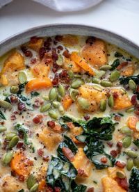 This sweet potato chowder is a hug in a bowl! Made with lots of greens and crunchy pancetta and pepitas for topping, it's a perfect weeknight meal.