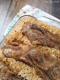 Baked Country-Style Ribs & Rice - A simple recipe for tender country-style pork ribs baked over a bed of perfectly seasoned rice.