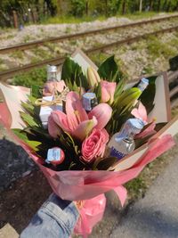 18 birthday bouquet with flowers and small bottles od vodka