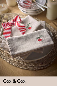 Crafted from cotton, our embroidered bauble napkins are the perfect combination of Christmas décor with a subdued and minimalist feeling.

With a simple embroidered bauble on the right hand side, the neutral background complements the minimal design creating a napkin that will blend into any dining setting seamlessly.