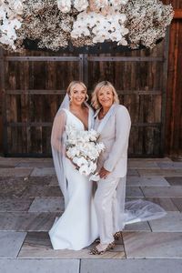 Looking for the most stylish mother of the bride pant suits? We've looked through tons of different pant suit styles from the most popular retailers, including David's Bridal, Dillard's, Macy's, and Azazie and have picked out the 15 best pant suit options out there. Step aside, mother of the bride dresses.