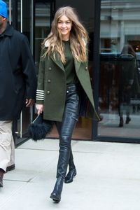 Gigi Hadid is blessing us with her hair in loose curls and a pair of leather pants.