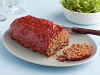 Good Eats Meatloaf : Alton uses a loaf pan as a mold, and then flips the meatloaf onto a parchment paper-lined baking sheet for cooking. With this method, your meatloaf will have a sweet and crispy crust on the outside.