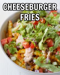 Cheeseburger Fries - crispy fries loaded with ground beef, cheese, all your favorite burger toppings, and an easy homemade burger sauce! Great for a weeknight dinner or party snack!