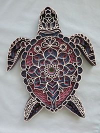 "This beautiful intricately cut wooden honu (turtle) mandala will add a fun and beachy vibe to any room.  The mandala measures 9.25\" length x 8\" width and 3/4\" in depth and is painted in beachy colors.  Made with aloha in Hawaii, USA."