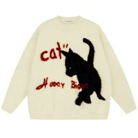 Follow This Curious Cat Journey On Its World Of Questions With Our Comfy Pullover Knit Black Cat Sweater! It is time to experience how to be playful but still full of curiosity with our Comfy Pullover Knit Black Cat Sweater! This long-sleeved, fuzzy, and soft sweater is completed with a silhouette of a curious black cat, posing perfectly as if intrigued by the rust-colored embroidered word "cat" above it. The raised tail and a quirky wiggly phrase below add a touch of movement and...