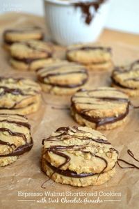 Up your shortbread game by sandwiching easy roll-and-slice shortbread cookies with a delicious dark chocolate ganache. Perfection with coffee or tea.