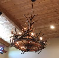 Wagon wheel/antler chandelier