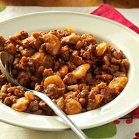 My husband raved about this sweet bean dish after tasting it at a party, so I knew I had to get the recipe. It's perfect for get-togethers because you can mix it up a day early and toss it in the slow cooker a few hours before your guests arrive. —Jan Biehl, Leesburg, Indiana