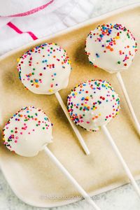 For a fun party activity, try making this easy cake pop recipe with the kids. It's simple to make with cake mix and a jar of frosting, but homemade ingredients from scratch can be used too! When it comes to decorations, the kids will have a great time coming up with their own sweet creations. #easycakepoprecipe #cakepopsrecipe #easybirthdaycakepops #theshortcutkitchen