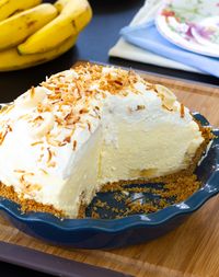 Piled high with fresh ripe bananas and creamy vanilla filling, then topped with whipped cream and toasted coconut. #aspicyperspective #foodblog #foodie #instayum #hungry #thekitchn #onmytable #dailyfoodfeed #foodlove #foodpic #instafood #foodstagram #tasty #bananacreampie #bananapie #pie #banana #creampie #fluffypie