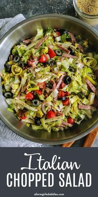 Italian Chopped Salad from afarmgirlsdabbles.com - an Italian salad loaded with fresh goodness, plus salami, provolone, pepperoncini, and olives. It's light, yet hearty, and extra flavorful with a zippy Italian vinaigrette!