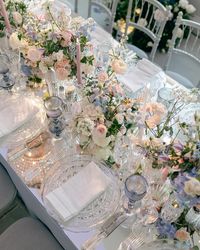 Introducing more enchanting floral scenes from a wedding earlier this month at the iconic Orangery at Kensington Palace. Mirror topped tables were dressed with shimmering vase and glassware chosen to reflect the light, and flowers were designed and selected to create a sense of gardenlike abundance tempered with an all important delicate airiness. As night fell, the scene transformed into an ethereal candlelit dream (scroll through the gallery ✨). One we won’t forget in a long time. Behin...