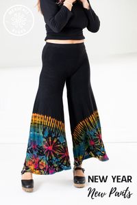 Boho chic elegance meets high fashion with funky tie dye flares and a splash of hippie style in the new Eclipse Tie Dye Palazzo pants.