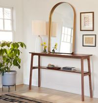 Add Farmhouse-Inspired Style To Your Home With Our Bilquist Console Table. Crafted From Solid Walnut With A Larger Lower Shelf For Easy Storage.