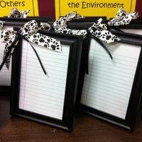 frame notebook paper, hot glue a bow, wrap with a dry erase marker ... Perfect for a To Do list!