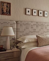 The guest bedroom in Project Bloom features a soft neutral palette, a bespoke headboard, and carefully curated details that evoke calm. In the ensuite, whitewashed oak vanity joinery and a striking Crema Delicatus granite countertop create a seamless flow between the two spaces. Photographer: @studio_rochowski   #elicyon #luxuryinteriordesign #bespokeinteriordesign #bathroomdesign #projectbloom