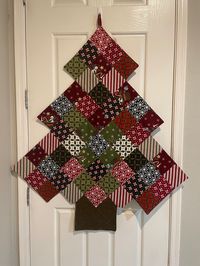 "Christmas Tree Door or Wall Hanging  Approximately :  Smaller-Height-38\" X Width-33\" ( red, green ) Larger-Height-48\" X Width-42\" (yellow, Flannel) 100% Cotton Machine washable cool/ Dry on Low/Iron if needed for retain crispness Handmade in USA in a smoke free environment Ready to ship in 1-3 business days via USPS w/tracking. Thanks for stopping by and looking, all questions are welcomed  ---------------------------------------------------------------------- We appreciate you, Have a grea