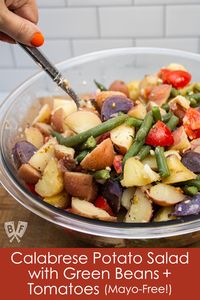 I learned to make this mayo-free potato salad from my Italian father-in-law, who grew up in Calabria, Italy. The mixture of potatoes, green beans, tomatoes, oregano, and vinegar make for such a refreshing side dish. Especially great when made with fresh summer produce, we love this recipe all year round. | Calabrese Potato Salad with Green Beans + Tomatoes |