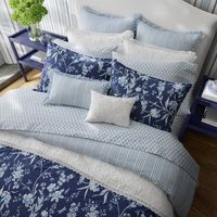 Laura Ashley Branch Toile is a stunning floral design which makes an elegant statement in deep indigo blue. The duvet and shams reverse to a classic blue and white shirting stripe, which is repeated in the matching European shams and ruffled pillow cover. A crisp white embroidered pillow cover adds a romantic touch. Twin 5 pc. Set includes:  1 twin duvet cover, 1 standard sham, 1 European sham, 2 decorative pillow covers. Full/queen 7 pc. Set includes:  1 full/queen duvet cover, 2 standard shams