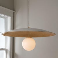 Our Hover Pendant has a clean and modern personality. The minimal yet distinguishable construction of the Hover allows light to be distributed beautifully while simultaneously highlighting the shade's gold leaf interior.