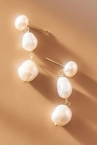 Darling and dainty, these earrings boast a trio of lustrous baroque pearls set into a delicate drop design.