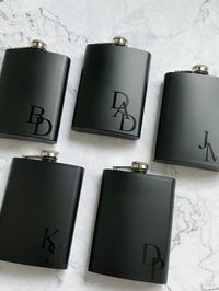 Our personalized stainless steel hip flask is the perfect gift to tuck into your proposal bags or boxes for the bridal party! Your groomsmen and bridesmaids are sure to love their completely personalized flasks! It's stainless steel and holds 8 ounces. Choose from various font colours and styles for either your bridesmaids or groomsmen! *due to shipping costs, please note a minimum of 3 per order. Orders with less than 3 selected for your quantity will unfortunately be cancelled* YOU MAY ALSO LIKE: METAL BOTTLE OPENER GROOMSMEN GIFTS: https://www.etsy.com/ca/listing/1354614046/personalized-bottle-opener-gift-for?click_key=2667cc8b66c43a6d9785d0487d7524390fa1da52%3A1354614046&click_sum=033462ea&ga_search_query=BOTTLE&ref=shop_items_search_1&pro=1&frs=1 PERSONALIZED GIFT BAGS: https://www.et