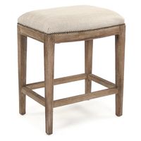 Elevate your counter area with our Cora Counter Stool with Nailhead Trim. Crafted with a limed grey oak frame and upholstered in oatmeal polyester, this rectangular counter stool exudes French Country elegance. #frenchcountry, #counterstool