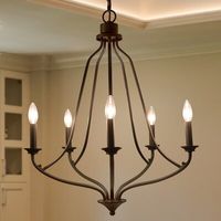 This unique 5-light classic empire candle-style chandelier blends traditional elegance with modern functionality. Featuring five gracefully curved arms extending from a central support, it creates a grand yet simple silhouette. Perfect for various décor styles—rustic farmhouse, transitional, mid-century modern, contemporary, and modern—this elegant French country chandelier adds timeless charm and sophistication to any space. Ideal for dining rooms, kitchens, large bedrooms, or foyers, it offers