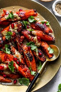 Harissa Roasted Carrots with Tahini Sauce - Dishing Out Health