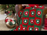 The Crochet Christmas Holiday Hearths Throw blanket is a unique shaped granny square. The interior is a heart shape.