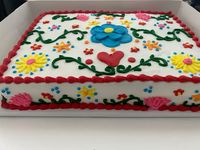 Fiesta themed sheet cake for a fiesta themed wedding rehearsal - made by Mommy and Me Bakery