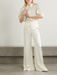 Overlooking seasonal trends in favor of classic styles, Gabriela Hearst's collections will last for years to come. Cut from glossy silk, these elegant, wide-leg 'Mabon' pants have pressed pleats for a refined touch and a tonal belt. Pair yours with a turtleneck sweater and boots.