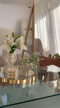 Elevate your floral arrangements with the Effie Flower Vase. A stunning fusion of artistry and functionality. Crafted from white ceramic, these vases exude timeless elegance, enhanced by delicate elements of female faces that adorn their surface. Available in three captivating styles, each vase offers a unique interpretation of feminine beauty, adding a touch of grace to any space.