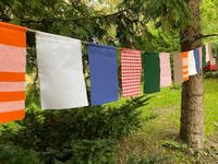 This is beautiful handmade colorful bunting garland to decorate parties inside or outdoor. I use vintage fabrics and linen cord. Fabrics I use are cotton, linen and wool. 7 flags in 1m, flags do not have finished edges!! As my garlands are made using vintage fabrics, the final look may very little bit. If one fabric is all used I will replace it to similar fabric. One flag measure is aprox. - L 18cm (7") W 13cm (5") Minimal length of garland is 1m ( 7 different flags) plus 70cm cord on both side