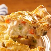 We know the best way to keep your crust from getting soggy on your chicken pot pie: It all depends on not having a soupy chicken filling. The filling should be thick when it comes off the stove; too much chicken broth and you'll run the risk of it seeping through your crust before it's baked. Get the recipe at Delish.com. #delish #easy #recipe #chicken #pot #pie #chickenpotpie #homemade #scratch #video #piecrust #crust #best #fromscratch