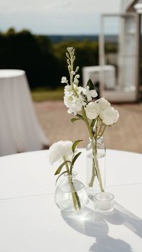 Simple wedding decor, wedding planner, wedding flowers, minimal wedding decor, classic wedding decor, wedding whites, bridal moment, wedding florals, cocktail hour decor, cocktial table decor