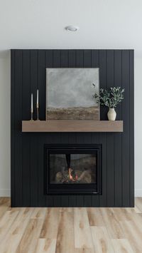 The fireplace in the Modern Craftsman new build is such a fun and moody focal point! We did a vertical install with the shiplap and painted… | Instagram