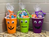 Our cute reusable cups are a perfect Halloween gift for that special someone! 1 Fun Dip 2 Mambas 2 Jolly Ranchers 1 Smarties 1 Sour Punch 1 Mini Starburst 1 Full Size Airhead 2 Picy Stixs 1 Laffy Taffy 1 Fun Size Sour Patch /Swedish Fish 1 Mini PopRock 1 Fun Size Reeses 1 Mini Rice Krispie Treat 1 Snack Size Hershey  1 Dum Dum