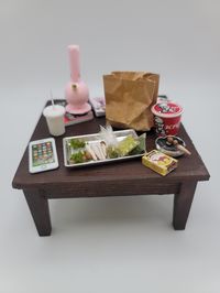 perfect for the smoker dolls!!! bong, rolling tray, baggies, and of course a bucket of chicken!!!