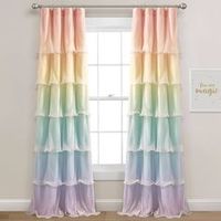 Experience the vibrant joy of this rainbow ruffled curtain set. Transform your space with a mesmerizing display of colors with cascading ruffles in every hue. This STANDARD 100 by OEKO-TEX® certified curtain set will enchant your child's bedroom.