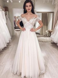 This beautiful A-line wedding dress features a delicate tulle fabric and an illusion neckline for a timeless and elegant look. The short sleeves and lace applique on the ruched surplice bodice add a touch of romance. With a sweep train, this dress is perfect for any traditional or outdoor wedding. This wedding dress can be custom made with no extra cost. 1, Color: picture color or other colors, there are 126 colors are available, please contact us for more colors, please ask for FABRIC SWATCH. 2