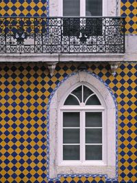 size: 24x18in Photographic Print: Window, Bairro Alto Poster by Walter Bibikow : Travel Photographer Walter Bibikow has traveled the world to capture breathtaking images spanning the intricacies of the tiniest flower to the grandeur of vast architectural and scenic wonders. For three decades, Bibikow has trekked to regions including Africa, the Middle East, the Caribbean and North America, often returning to a location several times during different seasons, or in changing nuances of light, to d