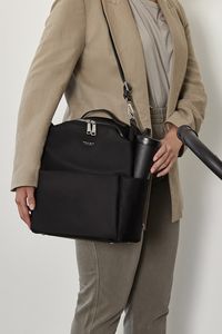 The Stevie Midi strikes the perfect balance with its spacious center compartment and easy-to-clean material, making it the ideal MINA bag for every occasion. Whether you're out for a quick errand or a day-long adventure, Stevie Midi has got you covered.