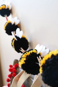 Bee Pom Pom Garland for a Bee Mine theme on Valentine’s Day